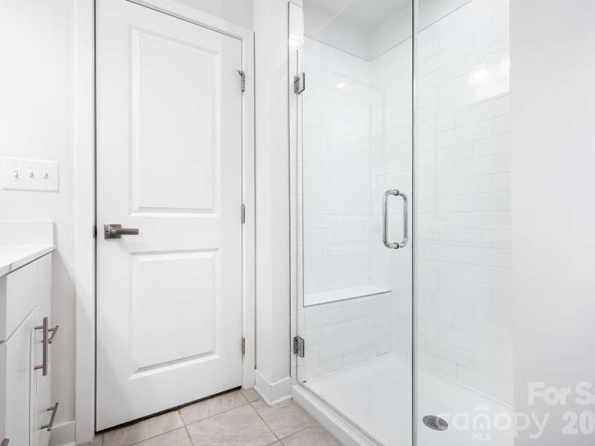 1226 Gleason Way, Charlotte, NC 28217.  MLS# CAR4405911, YatesRealty ID 17562. Primary bathroom shower