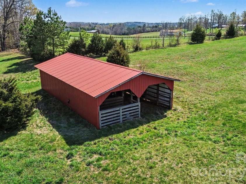 11410 Mount Olive Road, Gold Hill, NC 28071.  MLS# CAR4357988, YatesRealty ID 17567. Barn with 4 stalls and a tack room