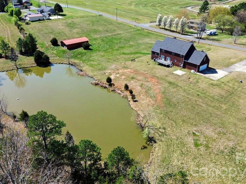 11410 Mount Olive Road, Gold Hill, NC 28071.  MLS# CAR4357988, YatesRealty ID 17567. Pond!
