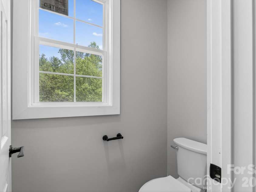 416 Whitmore Street, Lenoir, NC 28645.  MLS# CAR4363321, YatesRealty ID 17569. Water closet, primary bathroom