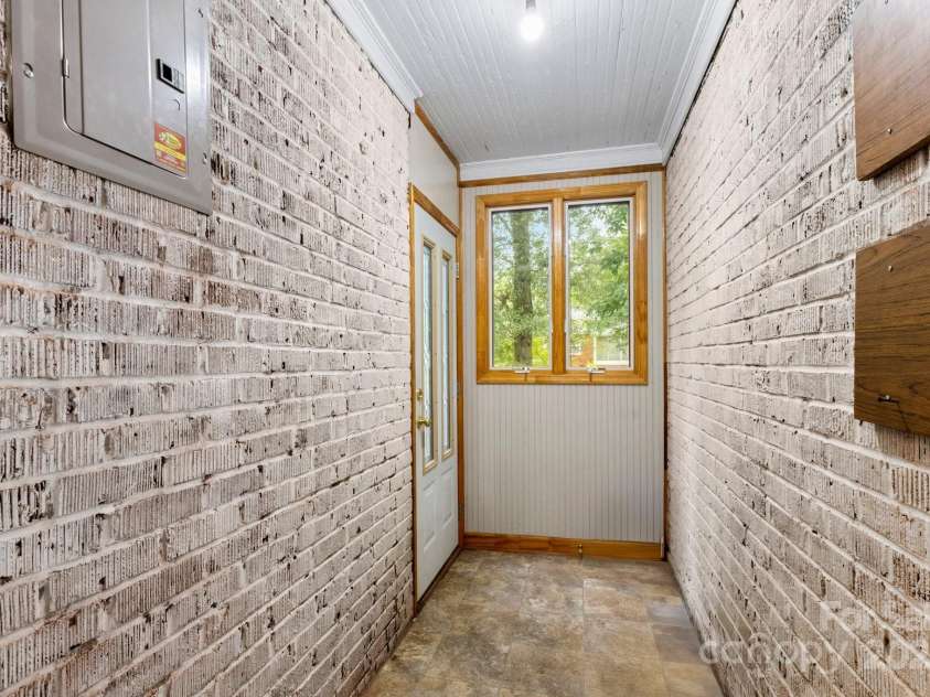 728 Blanton Street, Shelby, NC 28150.  MLS# CAR4274982, YatesRealty ID 1757. Hallway to back door and deck