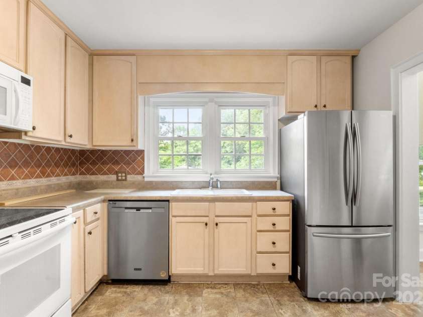 728 Blanton Street, Shelby, NC 28150.  MLS# CAR4274982, YatesRealty ID 1757. The kitchen offers a picturesque window above the sink,...