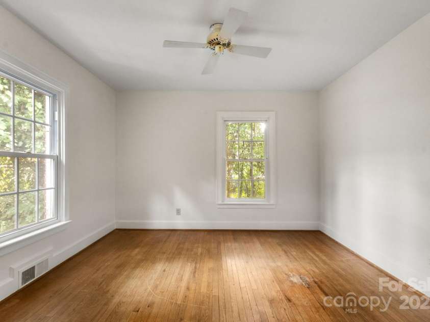 728 Blanton Street, Shelby, NC 28150.  MLS# CAR4274982, YatesRealty ID 1757. The wood floors and bright light continue into the second main level bedroom.