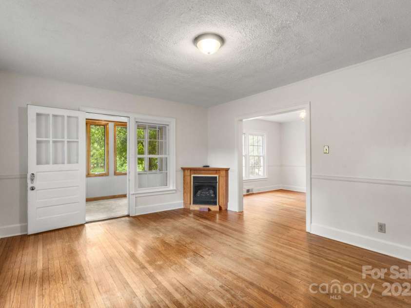 728 Blanton Street, Shelby, NC 28150.  MLS# CAR4274982, YatesRealty ID 1757. This spacious living room with beautiful hardwood floors and a gas fireplace greets you upon entry.