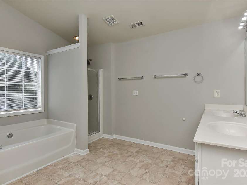 14501 Asheton Creek Drive, Charlotte, NC 28273.  MLS# CAR4258847, YatesRealty ID 17572. Bedroom 1 Bath