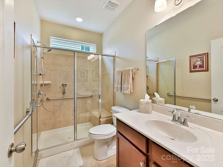 3020 Sewee Lane, Waxhaw, NC 28173.  MLS# CAR4210967, YatesRealty ID 17573. Full bath on main with walk-in shower, shower seat