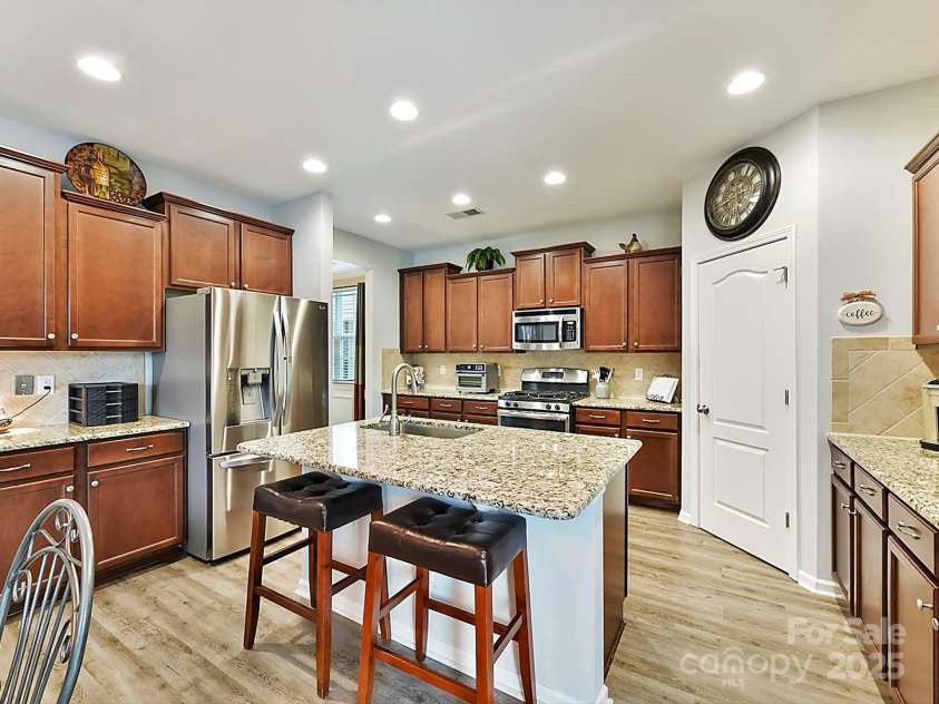 3020 Sewee Lane, Waxhaw, NC 28173.  MLS# CAR4210967, YatesRealty ID 17573. Kitchen has 3 separate counter areas w/cabinets