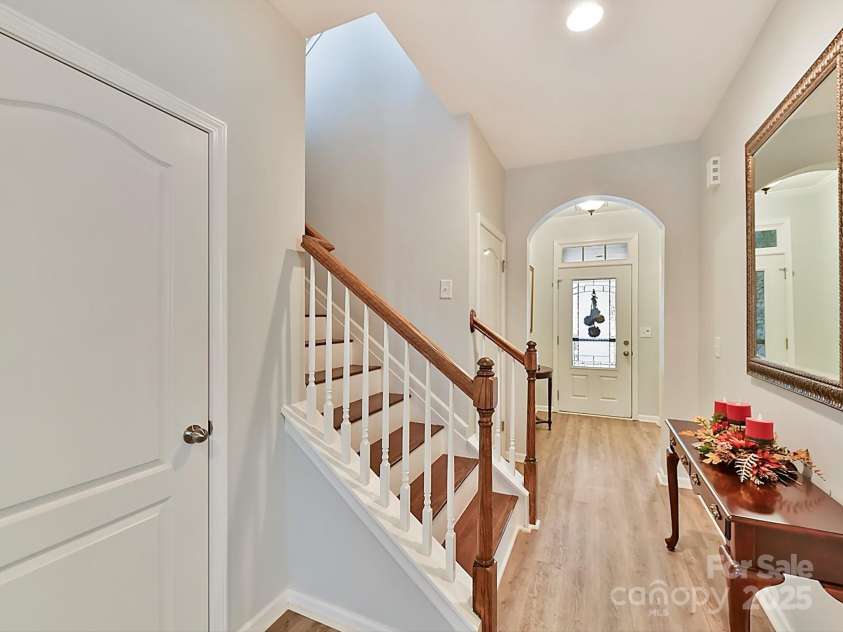 3020 Sewee Lane, Waxhaw, NC 28173.  MLS# CAR4210967, YatesRealty ID 17573. Lovely arched entryway leading to stairs and main level