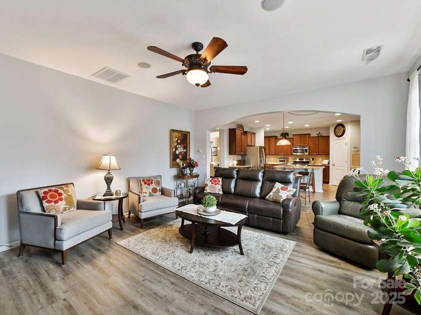 3020 Sewee Lane, Waxhaw, NC 28173.  MLS# CAR4210967, YatesRealty ID 17573. LR looking from FP towards Kitchen