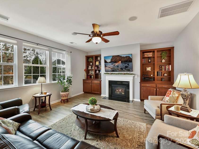 3020 Sewee Lane, Waxhaw, NC 28173.  MLS# CAR4210967, YatesRealty ID 17573. LR w/fireplace, gas logs, triple windows