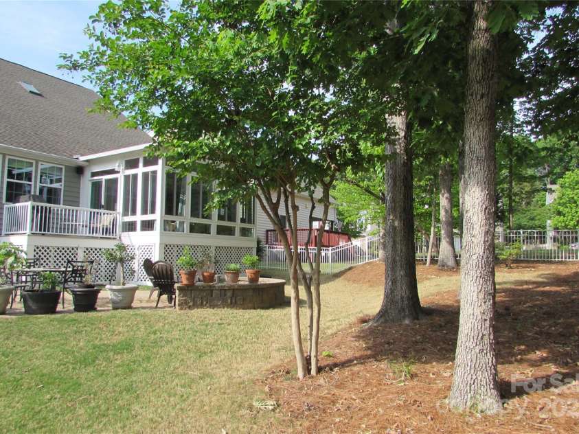 3020 Sewee Lane, Waxhaw, NC 28173.  MLS# CAR4210967, YatesRealty ID 17573. Open area with shade trees
