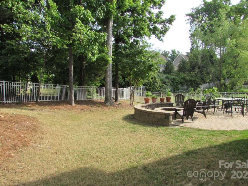 3020 Sewee Lane, Waxhaw, NC 28173.  MLS# CAR4210967, YatesRealty ID 17573. Patio with firepit