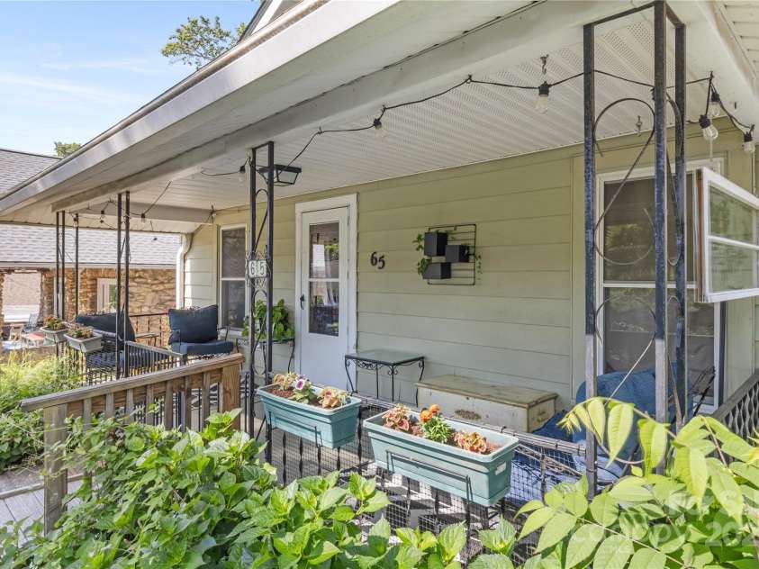 65 Craig Circle, Asheville, NC 28805.  MLS# CAR4259454, YatesRealty ID 17575. Fantastic front porch to sit and have coffee and enjoy the breeze