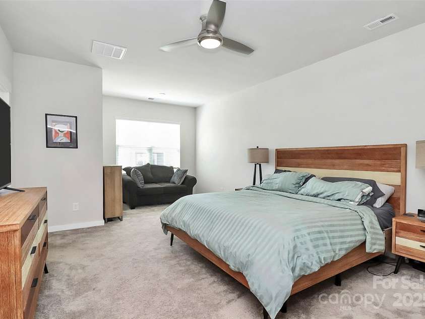 9521 Munsing Drive, Charlotte, NC 28269.  MLS# CAR4302669, YatesRealty ID 1758. As we move upstairs, the primary suite also has a carve-out for desk (not as if you need it here!)