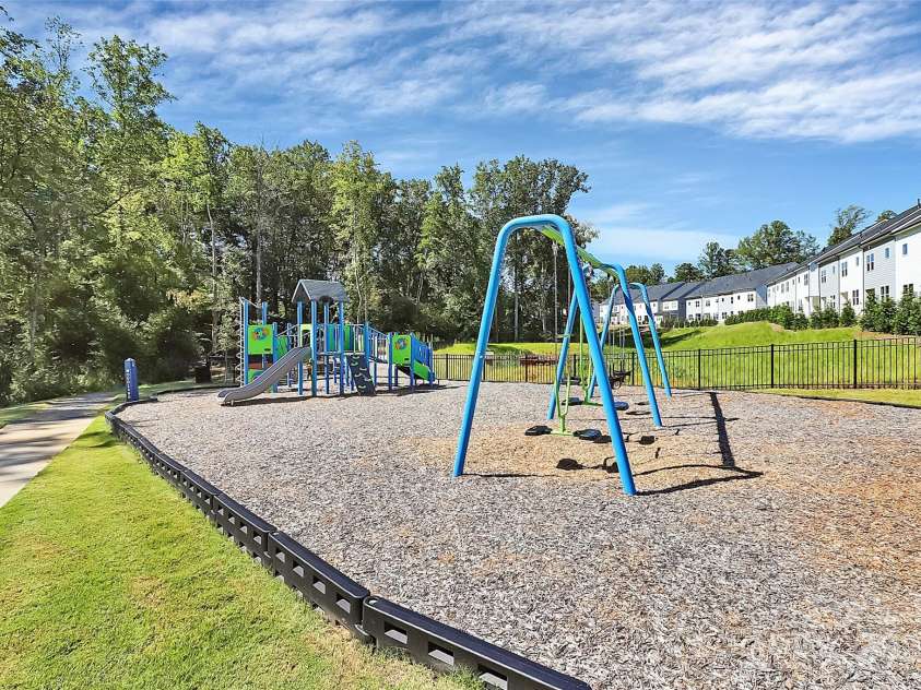 9521 Munsing Drive, Charlotte, NC 28269.  MLS# CAR4302669, YatesRealty ID 1758. Community amenities- playground