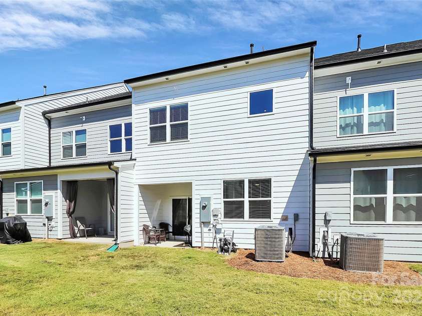 9521 Munsing Drive, Charlotte, NC 28269.  MLS# CAR4302669, YatesRealty ID 1758. Rear elevation