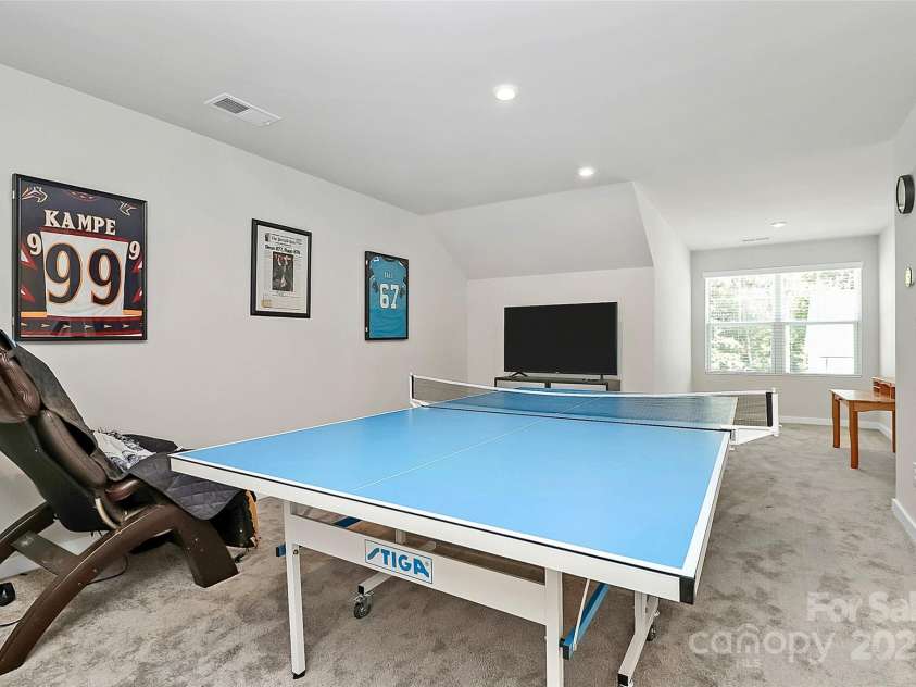 9521 Munsing Drive, Charlotte, NC 28269.  MLS# CAR4302669, YatesRealty ID 1758. Third-story loft, plenty of room to make a guest room, media room, game room-- possibilities are endless! 