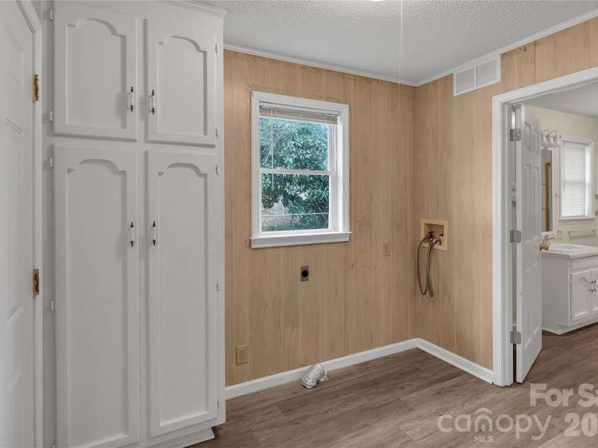 215 King Street, Gastonia, NC 28052.  MLS# CAR4335649, YatesRealty ID 17585. Laundry area with extra storage