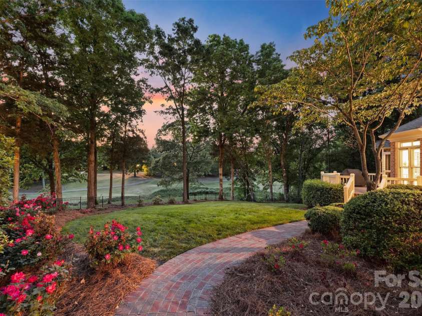4227 Shepherdleas Lane, Charlotte, NC 28277.  MLS# CAR4358480, YatesRealty ID 17586. The grounds are beautiful at twilight
