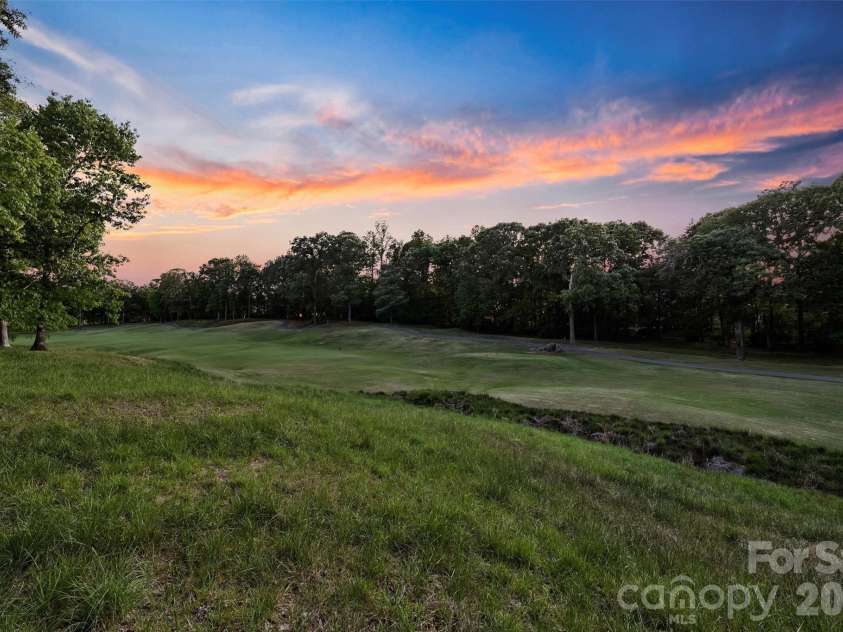 4227 Shepherdleas Lane, Charlotte, NC 28277.  MLS# CAR4358480, YatesRealty ID 17586. The sun is setting on the 5th Tee at Piper Glen Golf Course