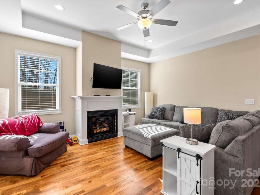 79 Greenwood Fields Drive, Asheville, NC 28804.  MLS# CAR4220069, YatesRealty ID 17589. Living room with gas logs