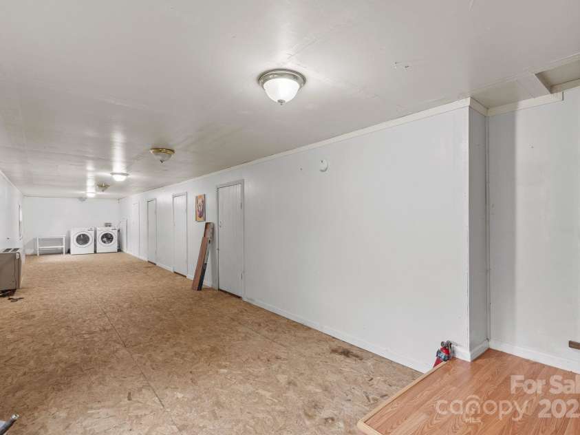 61 Doe Loop, Hot Springs, NC 28743.  MLS# CAR4295989, YatesRealty ID 1759. Unfinished basement w/laundry