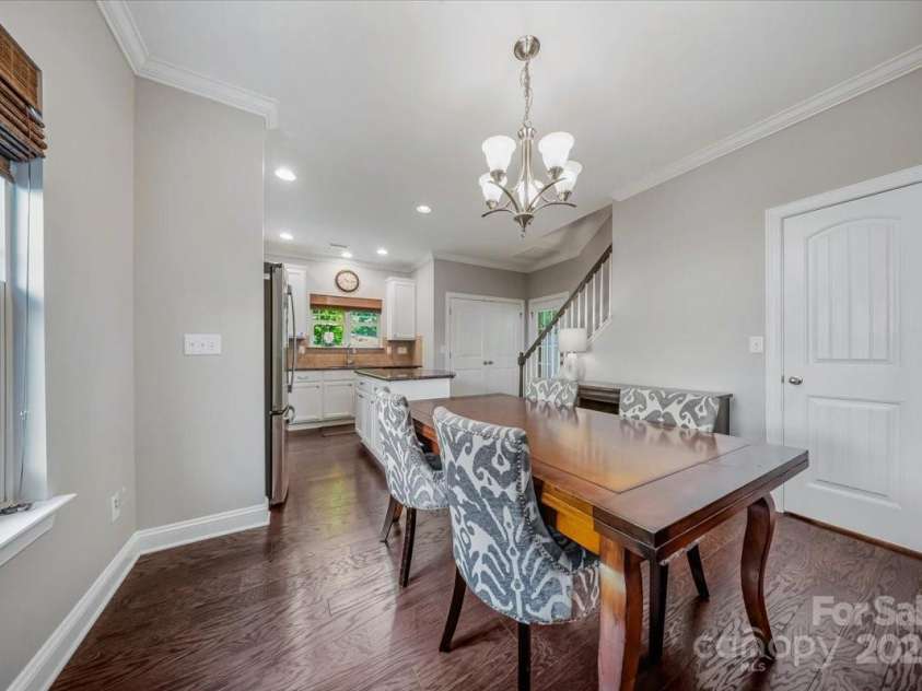204 Aztec Circle, Mooresville, NC 28117.  MLS# CAR4256248, YatesRealty ID 17590. Dining Area with door to pantry