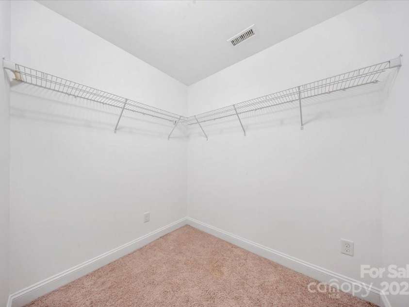 204 Aztec Circle, Mooresville, NC 28117.  MLS# CAR4256248, YatesRealty ID 17590. Extra large walk in storage closet off bonus room