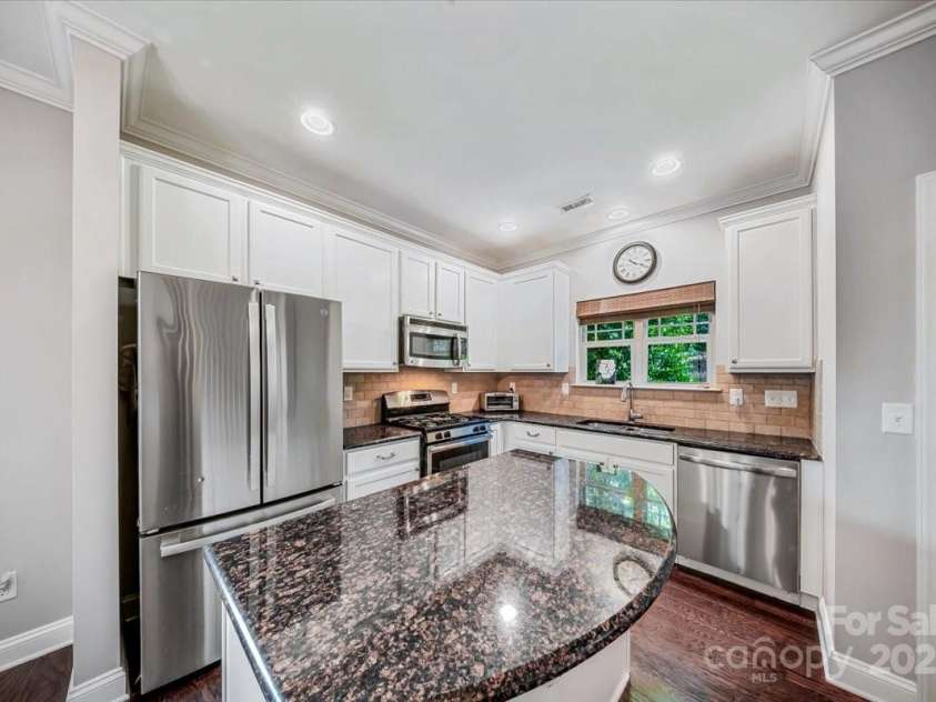 204 Aztec Circle, Mooresville, NC 28117.  MLS# CAR4256248, YatesRealty ID 17590. Kitchen area and Island