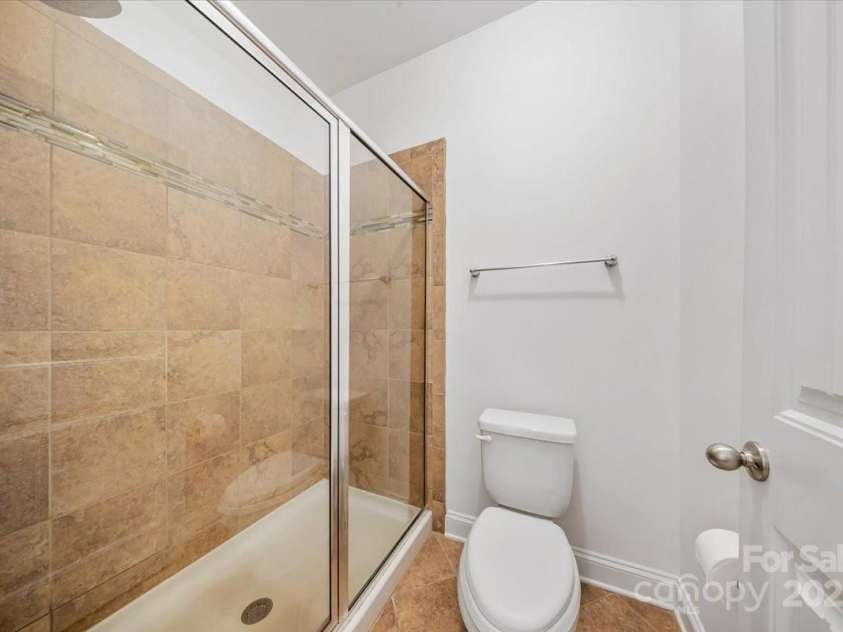 204 Aztec Circle, Mooresville, NC 28117.  MLS# CAR4256248, YatesRealty ID 17590. Primary Ensuite Walk in shower and toilet area