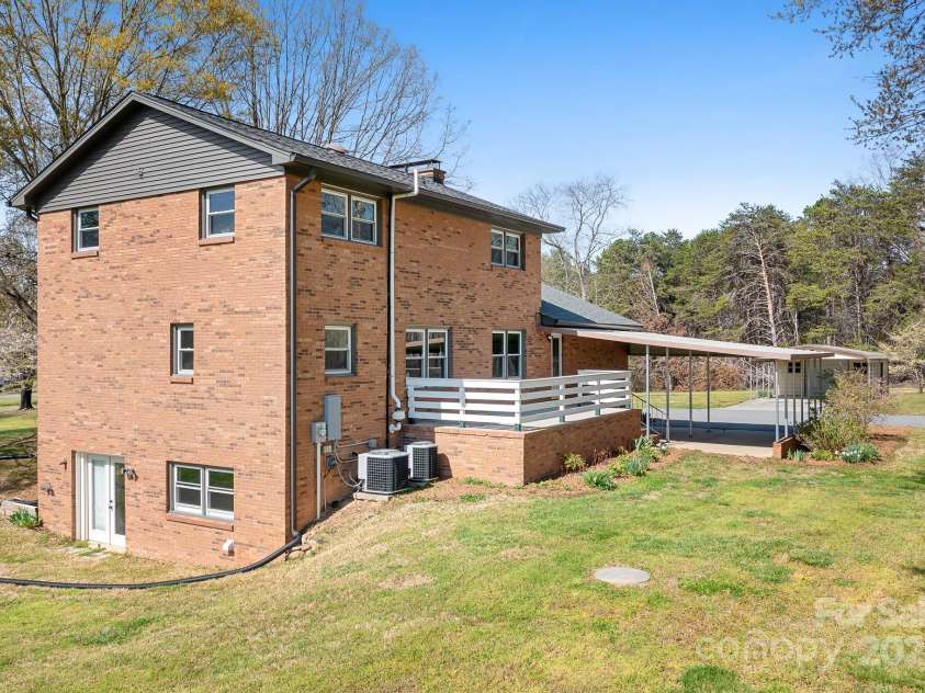 1235 Wilma Sigmon Road, Lincolnton, NC 28092.  MLS# CAR4238963, YatesRealty ID 17591. Rear view of the three story house.