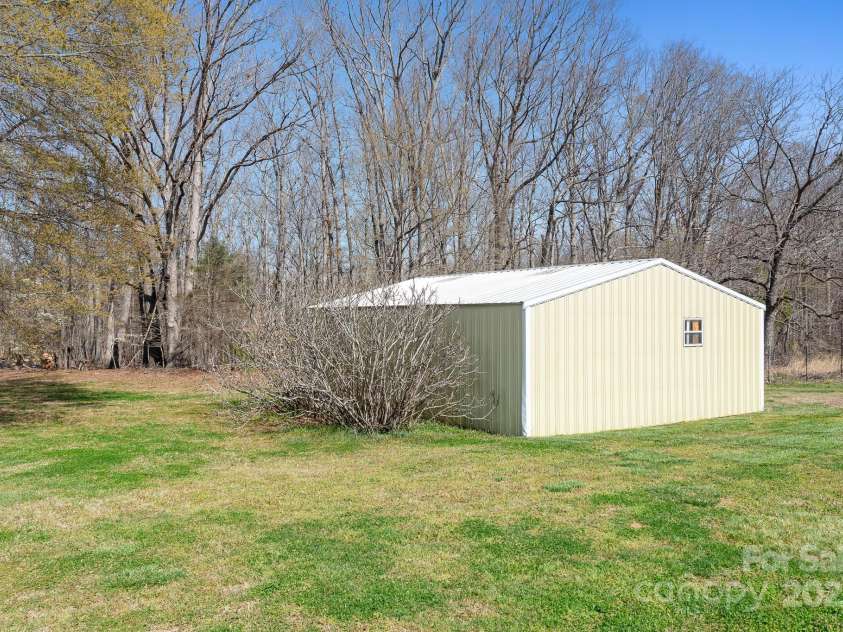 1235 Wilma Sigmon Road, Lincolnton, NC 28092.  MLS# CAR4238963, YatesRealty ID 17591. The huge storage building is perfect for all hobbyists.