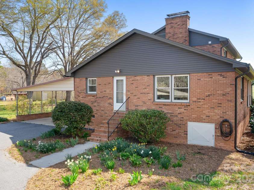 1235 Wilma Sigmon Road, Lincolnton, NC 28092.  MLS# CAR4238963, YatesRealty ID 17591. There are many entry points to the home.  This is on the driveway side.