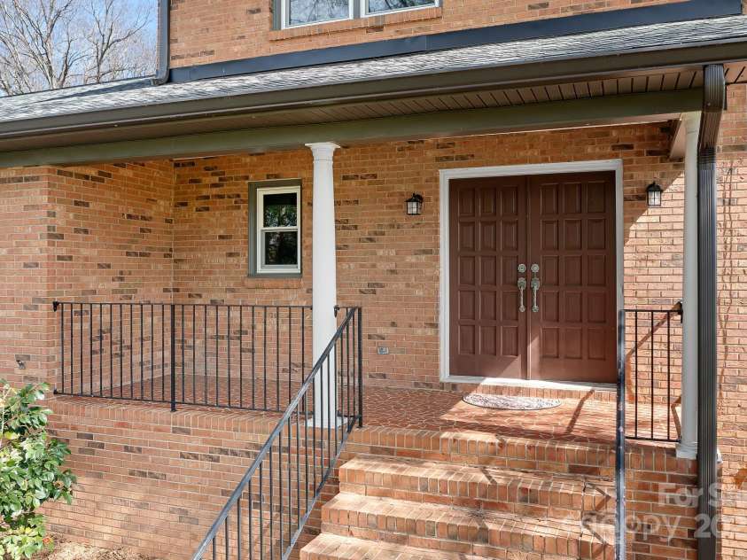 1235 Wilma Sigmon Road, Lincolnton, NC 28092.  MLS# CAR4238963, YatesRealty ID 17591. Welcoming front porch.