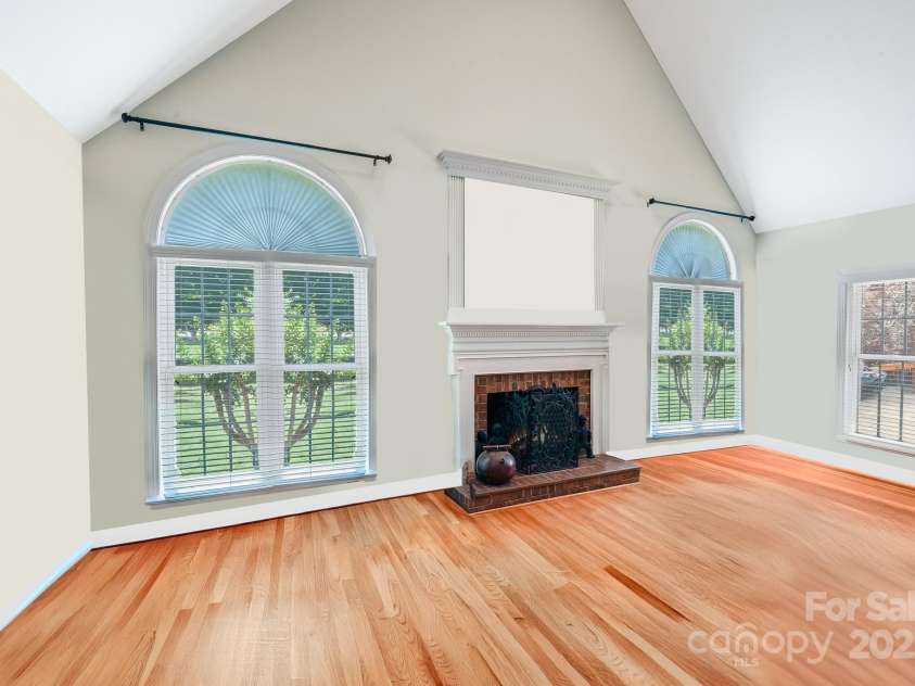 1337 Braeburn Road, Concord, NC 28027.  MLS# CAR4256587, YatesRealty ID 17594. Family room with fireplace