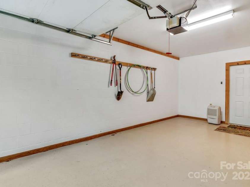 1501 Tanglewood Lane, Saluda, NC 28773.  MLS# CAR4266264, YatesRealty ID 17595. 2-car garage