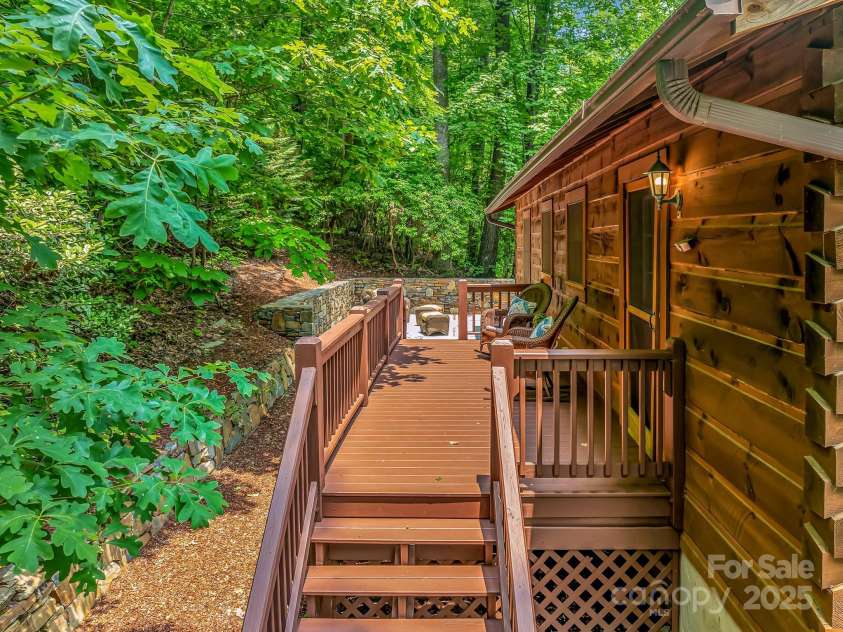 1501 Tanglewood Lane, Saluda, NC 28773.  MLS# CAR4266264, YatesRealty ID 17595. Back entry