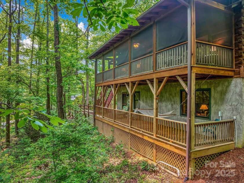 1501 Tanglewood Lane, Saluda, NC 28773.  MLS# CAR4266264, YatesRealty ID 17595. Enjoy porches from both levels