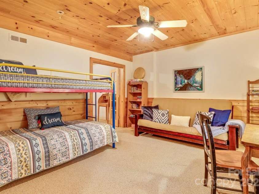 1501 Tanglewood Lane, Saluda, NC 28773.  MLS# CAR4266264, YatesRealty ID 17595. Family room for extra sleeping quarters