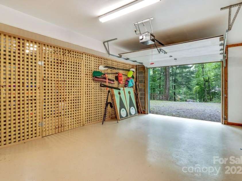 1501 Tanglewood Lane, Saluda, NC 28773.  MLS# CAR4266264, YatesRealty ID 17595. Garage 1 of 2