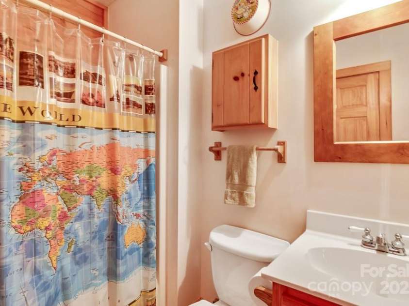 1501 Tanglewood Lane, Saluda, NC 28773.  MLS# CAR4266264, YatesRealty ID 17595. Guest bath