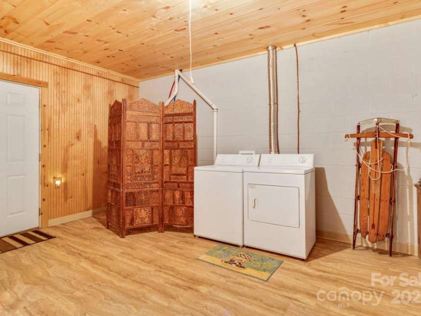 1501 Tanglewood Lane, Saluda, NC 28773.  MLS# CAR4266264, YatesRealty ID 17595. Laundry area