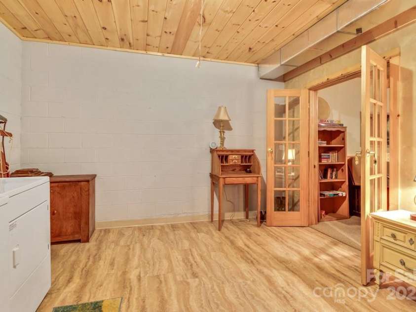 1501 Tanglewood Lane, Saluda, NC 28773.  MLS# CAR4266264, YatesRealty ID 17595. Laundry room just needs b-board to on walls to finish.