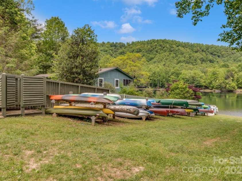 1501 Tanglewood Lane, Saluda, NC 28773.  MLS# CAR4266264, YatesRealty ID 17595. Resident Boat Racks at Community Beach