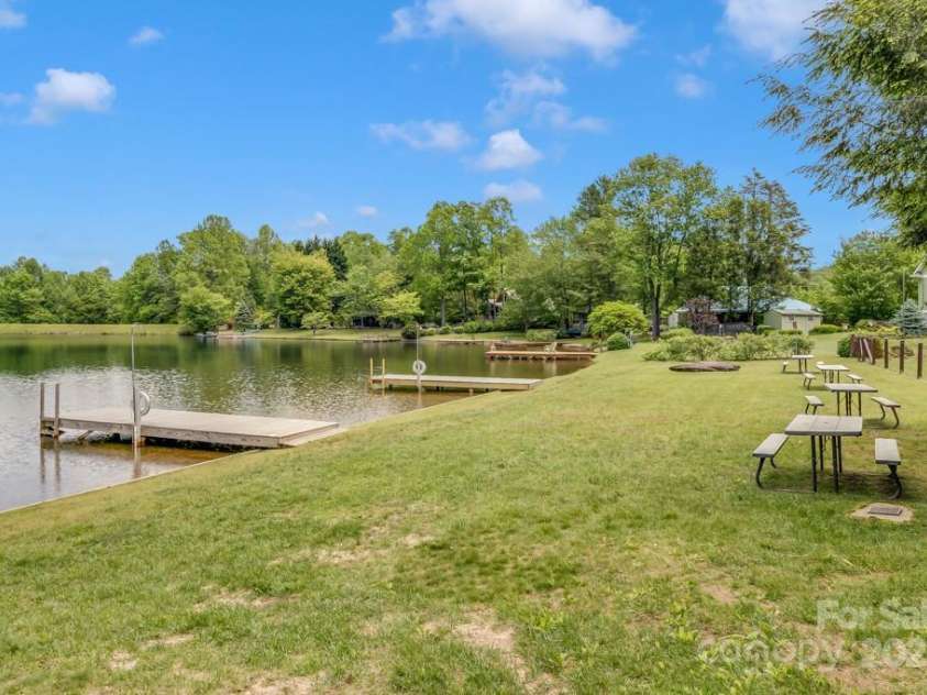 1501 Tanglewood Lane, Saluda, NC 28773.  MLS# CAR4266264, YatesRealty ID 17595. Residents enjoy community docks & picnic tables