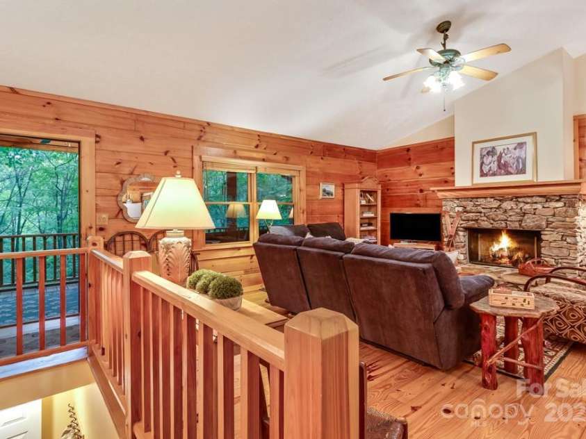 1501 Tanglewood Lane, Saluda, NC 28773.  MLS# CAR4266264, YatesRealty ID 17595. Stairs to partially finished basement