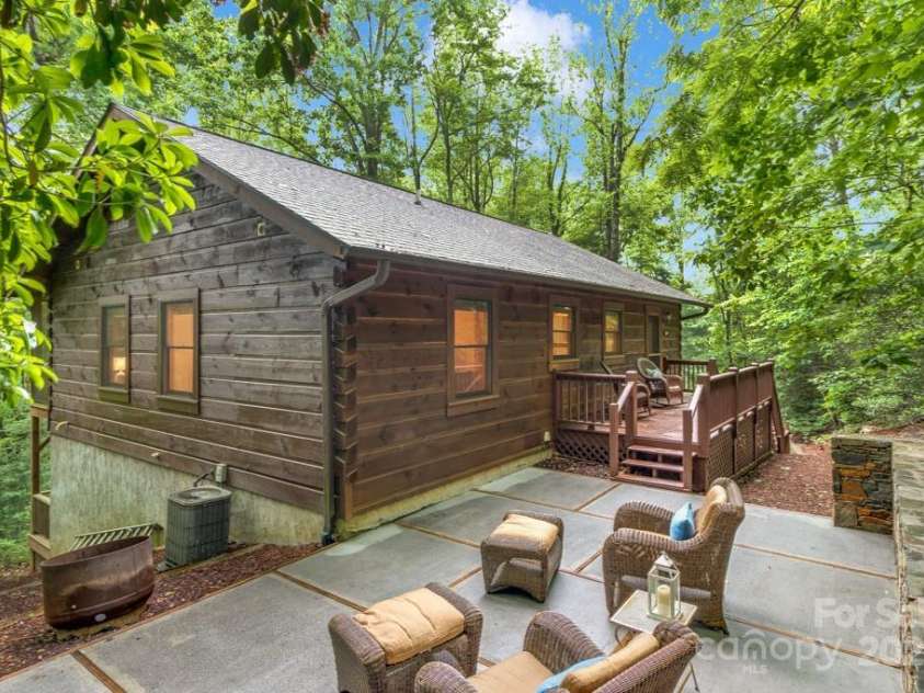 1501 Tanglewood Lane, Saluda, NC 28773.  MLS# CAR4266264, YatesRealty ID 17595. Stone pation to enjoy the outdoors