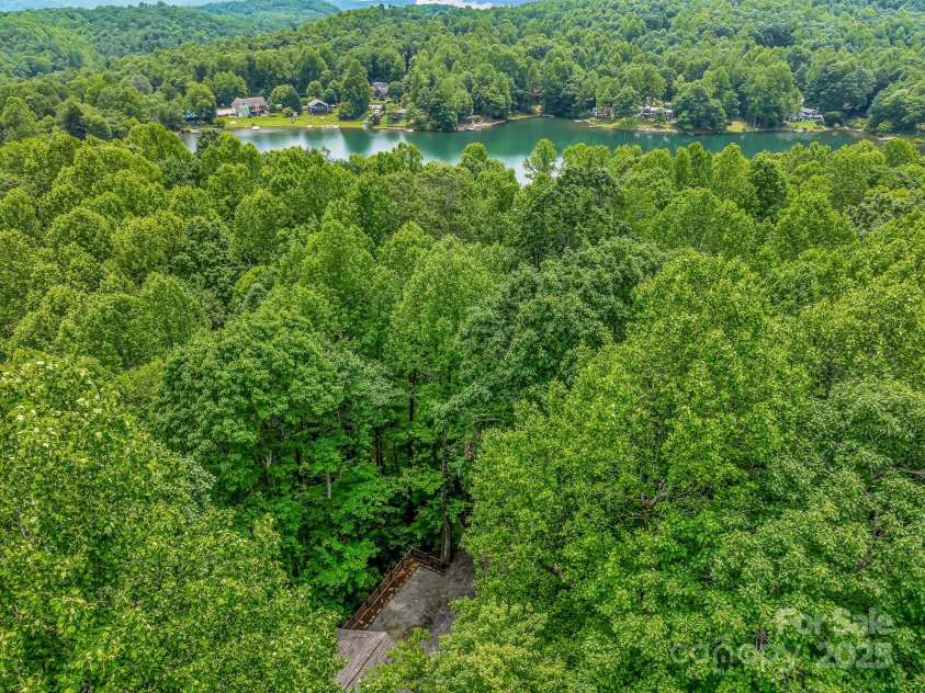 1501 Tanglewood Lane, Saluda, NC 28773.  MLS# CAR4266264, YatesRealty ID 17595. Taken above the Cabin.  Winter view of the lake.
