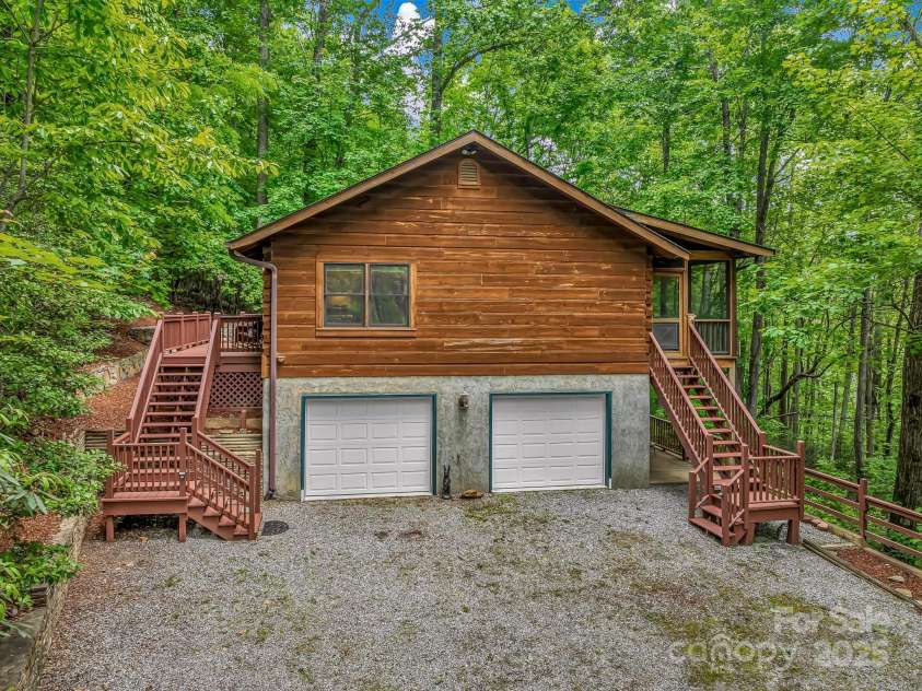 1501 Tanglewood Lane, Saluda, NC 28773.  MLS# CAR4266264, YatesRealty ID 17595. Wide gravel driveway for easy turn around