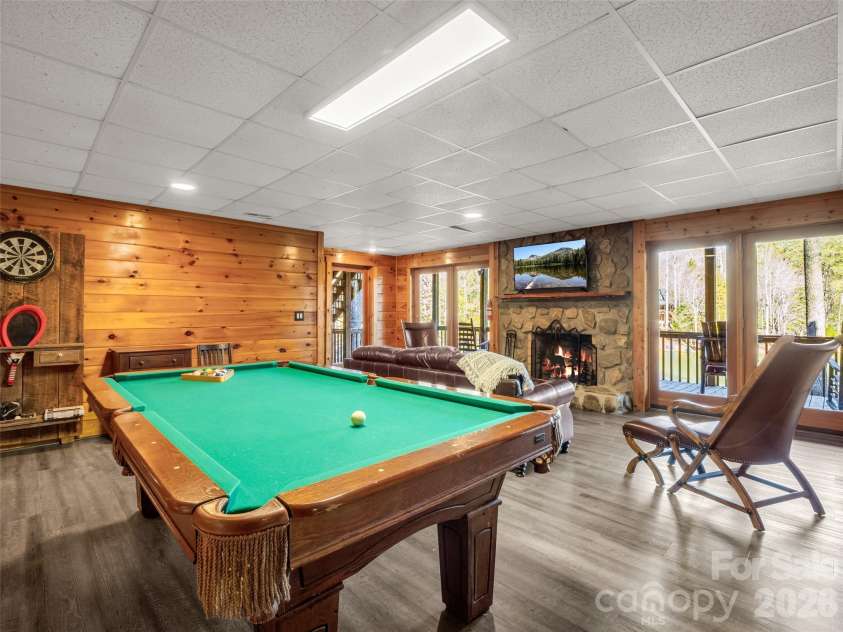 446 Rainbow Circle, Lake Lure, NC 28746.  MLS# CAR4329163, YatesRealty ID 17596. Entertainment room in lower level